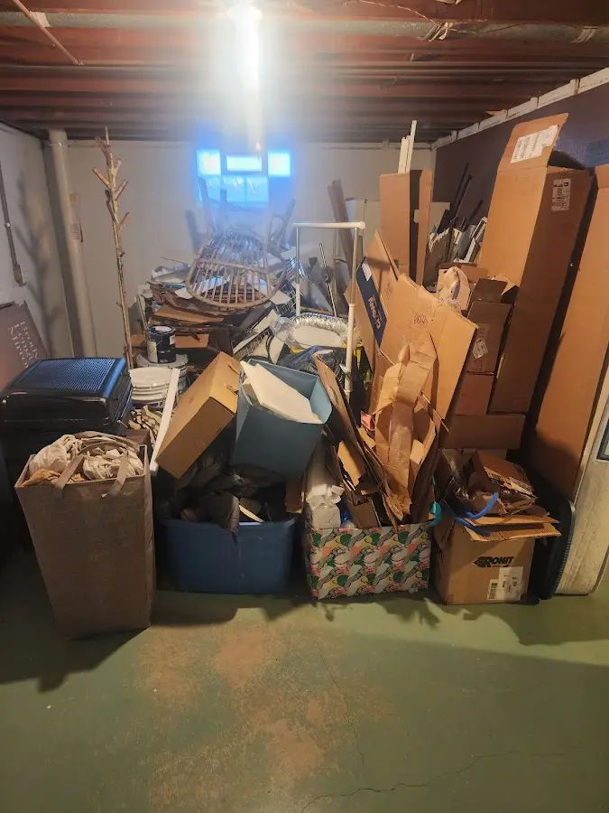 Roll-off dumpster container at job site for 20 Yard Dumpster Rental in Bow